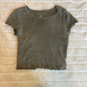 Here is a cute green short sleeve crop top from American Eagle!